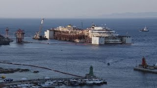 La Costa Concordia riemerge dalle acque del Giglio [upl. by Otsedom306]