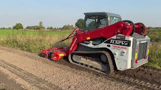 Grinds Mulches Buries TAKEUCHI TL12V2 with CONETEKS 213M Universal Rottor [upl. by Eleinad]