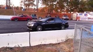 Cadillac STS vs Ford Mustang at the drag strip round 2 [upl. by Laehcym]