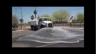 Truck Works Inc Manufactured Water Trucks  4000 gallon tanks spraying 1 CAT Water Truck [upl. by Nirat]