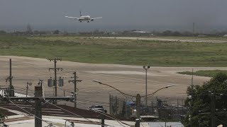 Haiti’s main international airport reopens nearly three months after violence forced it closed [upl. by Asenev]