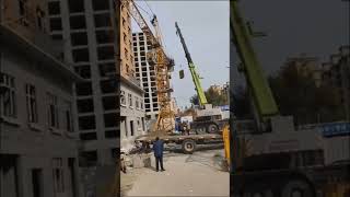 Crane collapse Hire crane satring plate down Construction mobile crane [upl. by Baseler159]