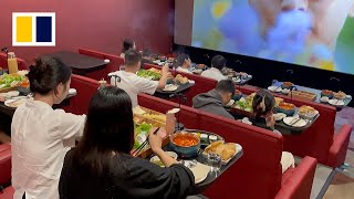 Moviegoers indulge in growing trend of ‘hotpot cinema’ [upl. by Meesak]