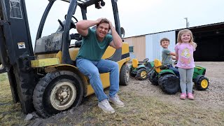 Using kids tractors to save stuck forklift in the mud  Tractors for kids [upl. by Eerac]