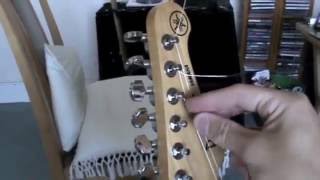 How To String A Guitar Part 1 [upl. by Phip]