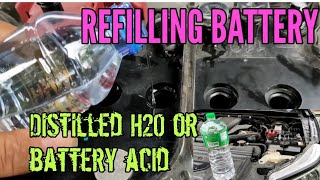 DIY Refilling battery with distilled water NISSAN NAVARA EL stock battery [upl. by Moht414]