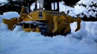 Fumotec Komatsu D65WX playing in the snow [upl. by Hteazile295]