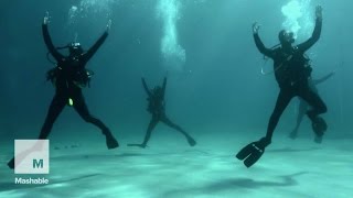 DancersTurnedDivers Put on Majestic Underwater Performance  Mashable News [upl. by Cirtemed]