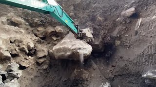 Large stones were successfully piled up by the excavator [upl. by Felicdad1]