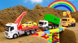 Rescue the truck from the pit with excavator and crane truck  Police car toy stories  Mega Trucks [upl. by Einnil]