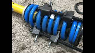 5 Tips For Working With Coil Spring Compressors  Coilover Strut Assembly [upl. by Pamelina324]