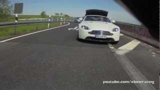 Aston Martin Vantage V8 Roadster opening roof while driving [upl. by Bettine]