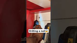 Drilling a nail into board  shorts drilling nail fyp [upl. by Jeniffer]