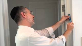 How to put up a mezuzah by Rabbi Kauffman [upl. by Rosemary]