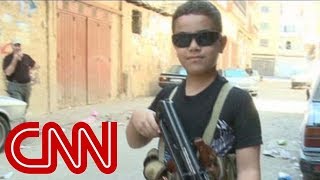 Child fighter with AK 47 on Syria border [upl. by Euqinahc]