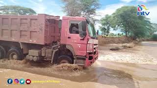 Daring motorists cross flooded River Kalemngorok in Turkana county [upl. by Ogdon]