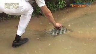 Dr Koh Poh Koon unclogs drain at Punggol East [upl. by Kass50]