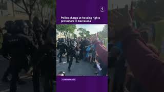 Police charge at Barcelona protesters [upl. by Nnayram]