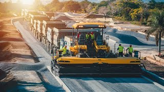 The machinery used in road construction includes gravellaying machines and compacting machines [upl. by Elehcin]