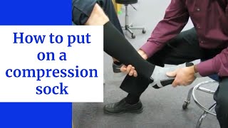 How to put on a knee high compression sock [upl. by Teteak58]