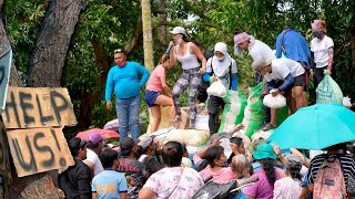 RELIEF AID TO TYPHOON VICTIMS ON CHRISTMAS DAY HELP US signs everywhere [upl. by Ennaylil717]