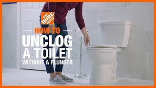 How to Unclog a Toilet Without a Plunger  Toilet Repair  The Home Depot [upl. by Eibob]