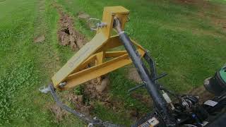 John Deere 1025R Trenching County Line Sub Soiler Tractor Supply Yard Water Management [upl. by Enilraep]