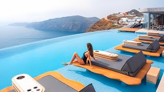 CAVO TAGOO Hotel Santorini Imerovigli Greece  Stunning Sunset  4K Travel Vlog [upl. by Ellatsyrc]