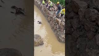 River stone berm construction process [upl. by Rosaleen27]