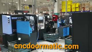 CNC DOORMATIC amp DOOSAN PUMA CNC LATHE AUTODOOR SYSTEMS SERVO cnclathe cncturning dnsolutions [upl. by Eimaj]