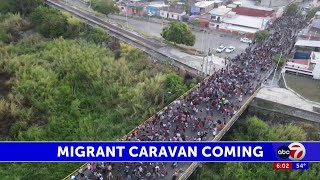 Migrant caravan walking towards the borderland [upl. by Albemarle]