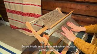 Rigid heddle loom Winding the weaving [upl. by Ennaecarg]