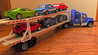 Video About Toy Cars Being Transported By Trucks 2 Car Transporters [upl. by Ahsead]