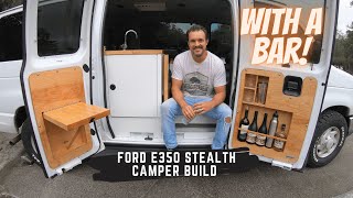 Ford E350 Econoline van stealth camper conversionwith a bar [upl. by Camm]