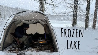 HOT TENT Camping in a SNOW STORM by a Frozen Lake [upl. by Avilla]