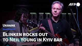 Blinken rocks out to Neil Young in Kyiv bar on visit to Ukraine  AFP [upl. by Veneaux852]