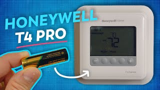 How to Replace the Battery in Honeywell quotRoundquot Thermostats [upl. by Aletsirc]