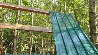 Woodland roundwood hut build part 8 The first roof panels [upl. by Fennessy]