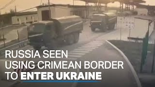 Russian military seen entering Ukraine through Crimea [upl. by Magnum]