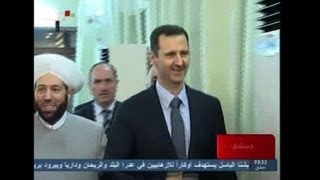 Syrias Assad at Eid prayers in Damascus [upl. by Leahcimed21]