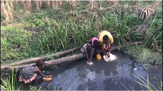 Fetching water at our village wellafrican villagelife [upl. by Anauqahs]