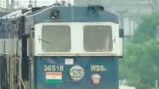 NAVY BLUEWHITENAVY BLUE GE CAB SHUNTER ENGINE MOVES AT YARD WDS6 36518 [upl. by Ralat593]