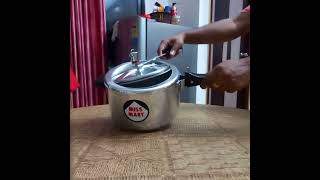 How to open Hawkins pressure cooker  inner lid Pressure Cooker open technique  Hawkins cooker [upl. by Stormi]