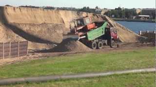 Разгрузка ДТ75 от КАМАЗа  Unloading DT75 tractor from KAMAZ truck [upl. by Aneeg]