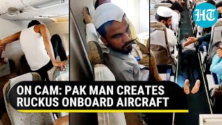 Pak flyer damages window shutter kicks seats onboard Dubai flight  Watch [upl. by Durrace287]