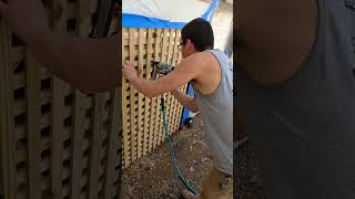 We built a hidden door in this handmade lattice Definitely a clean look for under porch access [upl. by Opalina483]