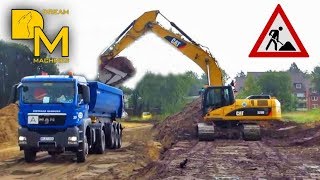 Excavator striping down overburden amp loading dump truck with topsoil [upl. by Mini]