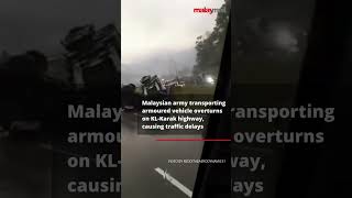 Malaysian army transporting armoured vehicle overturns on KLKarak highway [upl. by Ronoc485]