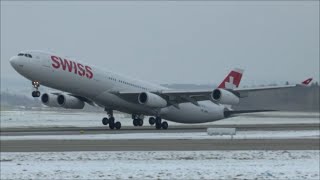 Swiss Airbus A340 extremely close amp heavy takeoff at Zurich Airport  snowy weather [upl. by Avron]