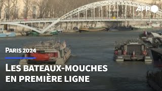 Paris2024 les bateauxmouches parisiens en première ligne de la cérémonie douverture  AFP [upl. by Lian277]